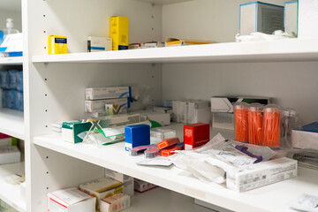 Shelves with various medicines and medical supplies