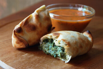 Argentinian empanada stuffed with spinach and cheese