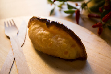Argentinian empanada stuffed with spinach and cheese