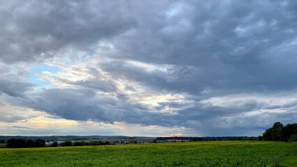 Magic sky and clouds. Enchanting view.