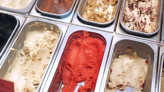 chocolate, vanila and orange favor of ice cream display for sale 