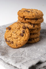delicious homemade and freshly baked cookies over white table, isolated background