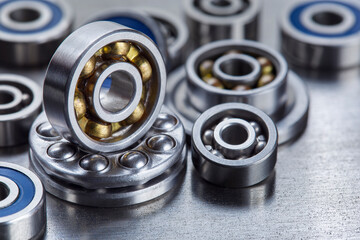 different bearings on a metal background. Part of mechanism.