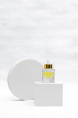 Trendy Beauty concept of Facial Serums, Natural Essential Oil in cosmetic bottles with dropper and bright sunligth shadow on white background.
