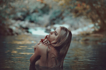 Fototapeta premium Woman immersed in river of dreams