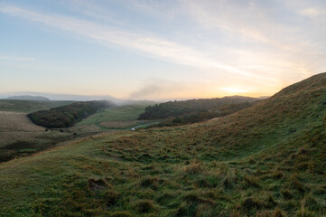 Early misty morning at Witches Point, Bridgend, at sunrise