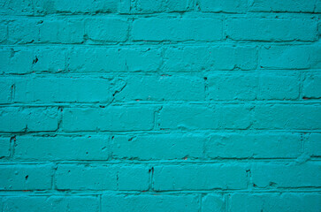 Brick old wall in turquoise color. Vintage texture template with empty space for text.