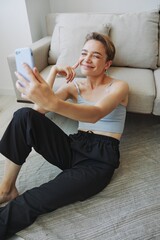 Woman blogger selfies on phone, selfies and online conversations for followers, teenager develops social media, freelancer from home