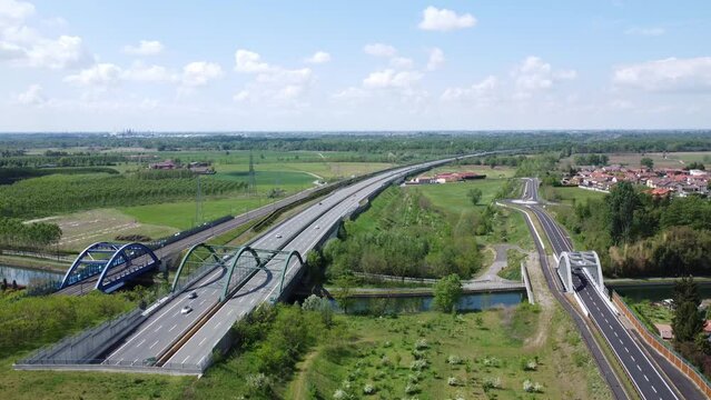 Aerial view of the highway and high speed rail, Bernate, near Milan, Italy