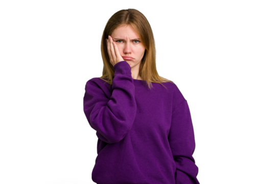 Young caucasian woman isolated who feels sad and pensive, looking at copy space.