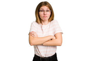 Young caucasian woman isolated shrugs shoulders and open eyes confused.