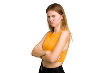 Young caucasian woman isolated frowning face in displeasure, keeps arms folded.