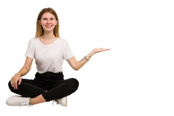 Young caucasian woman sitting on the floor cutout isolated