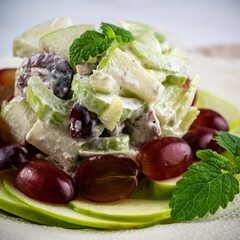 Traditional waldorf salad with apples, celery, walnuts, and grapes with a mayo dressing.
.