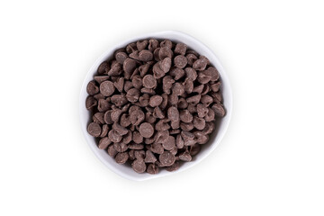 dark chocolate chips on white background, top view
