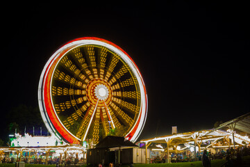 Summerfest carnival wheel at night, long exposure, in Munich, Germany