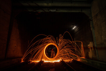 Long exposure photography of steel wool, light painting at night