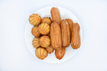 Custard cake with filling. Sweet eclairs. Flour cake with sweet filling.