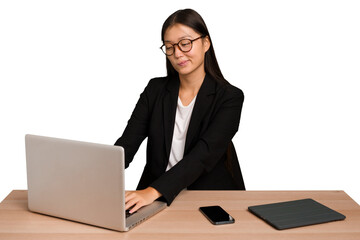 Young asian business woman working in his workplace isolated