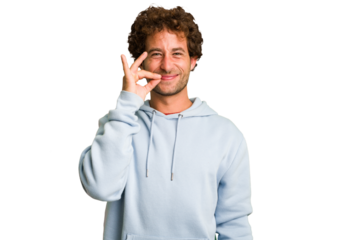 Young curly smart caucasian man cut out isolated with fingers on lips keeping a secret.