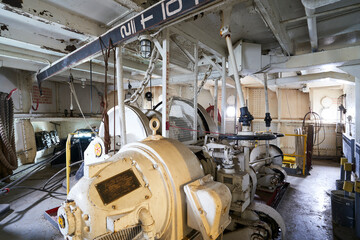 The anchor windlass aboard the william g mathers steamship in cleveland. This giant motor winds the chain to raise and lower the anchor.
