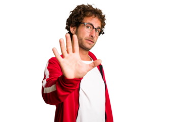 Young curly smart caucasian man cut out isolated being shocked due to an imminent danger