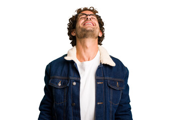 Young curly smart caucasian man cut out isolated relaxed and happy laughing, neck stretched showing teeth.