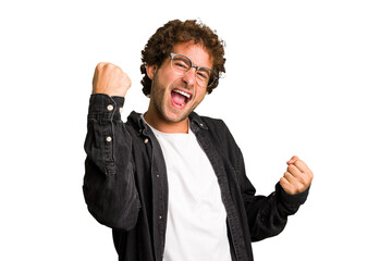 Young curly smart caucasian man cut out isolated cheering carefree and excited. Victory concept.