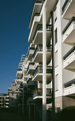 Multiple balconies of an apartment building - real estate investment in properties