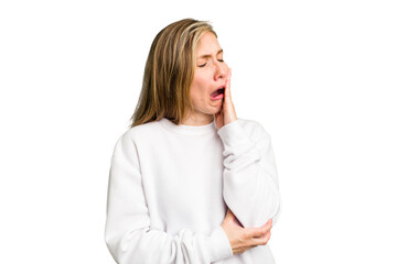 Young caucasian woman cutout isolated yawning showing a tired gesture covering mouth with hand.