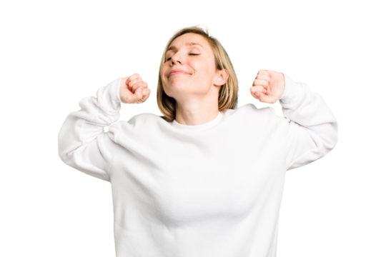 Young caucasian woman cutout isolated stretching arms, relaxed position.