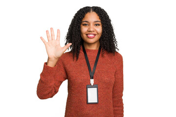 Young african american woman with ID card isolated smiling cheerful showing number five with...