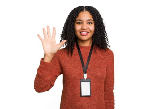 Young african american woman with ID card isolated smiling cheerful showing number five with fingers.