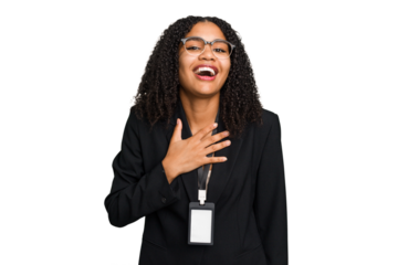 Young african american business woman with ID card isolated laughs out loudly keeping hand on chest.