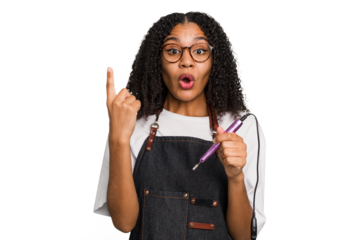 Young african american manicurist woman holding an electric file drill isolated having some great idea, concept of creativity.