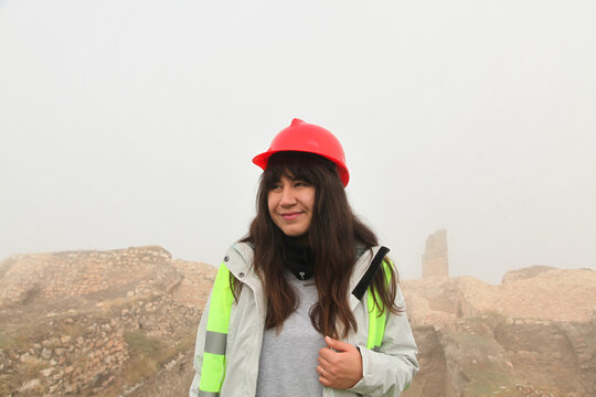 Female archaeologist working on an archaeological site