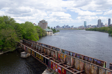 Fototapeta na wymiar Boston city is viewed from the Boston University Bridge. Charles River.