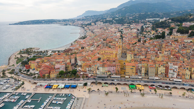 Aerial view on coast and buildings in old Town Menton, France. Drone photo. High angle view of town