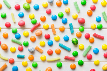 colorful candies as background top view. Seamless pattern with candy. Many sweet candies close-up