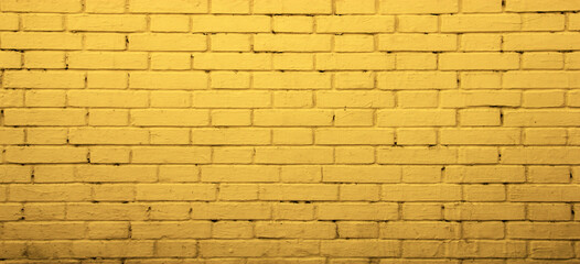 Yellow street brick wall background or texture