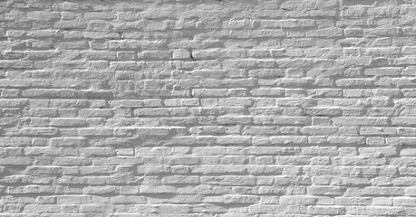 Urban white street brick wall background or texture
