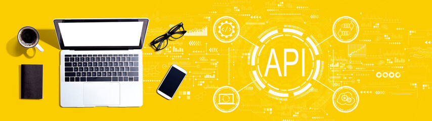API - application programming interface concept with a laptop computer on a desk