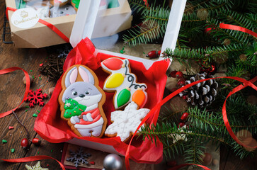 Box of Gingerbread Cookies on Wooden Background, Set of Christmas Treats