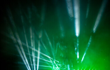  Laser show. Night club, lights, smoke machine. Green background