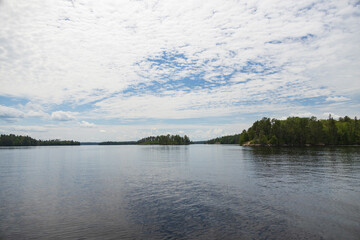 Lake, forest, cloudscape