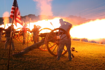civil war reenactment canon being fired  - obrazy, fototapety, plakaty