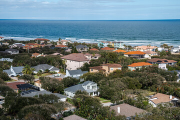Aerial view of the town of Ponce Inlet Florida on a sunny day, with a view of the Atlantic Ocean