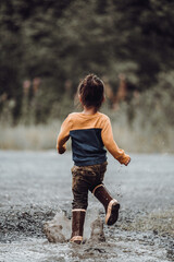 Toddler playing in water