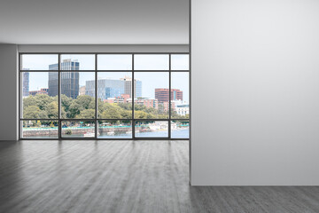 Panoramic picturesque city view of Boston at day time from modern empty room, Massachusetts. An intellectual and political center. Mockup copy space empty wall. Display concept. 3d rendering.