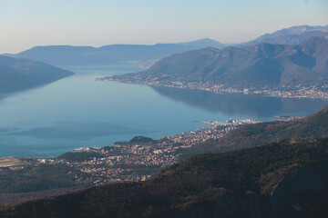 Fototapeta na wymiar The Bay of Kotor, Beautiful aerial view of Boka Kotorska, with Kotor, Herceg Novi and Tivat municipalities in a sunny day, Adriatic sea and Dinaric Alps with Lovcen and Orjen mountains, Montenegro